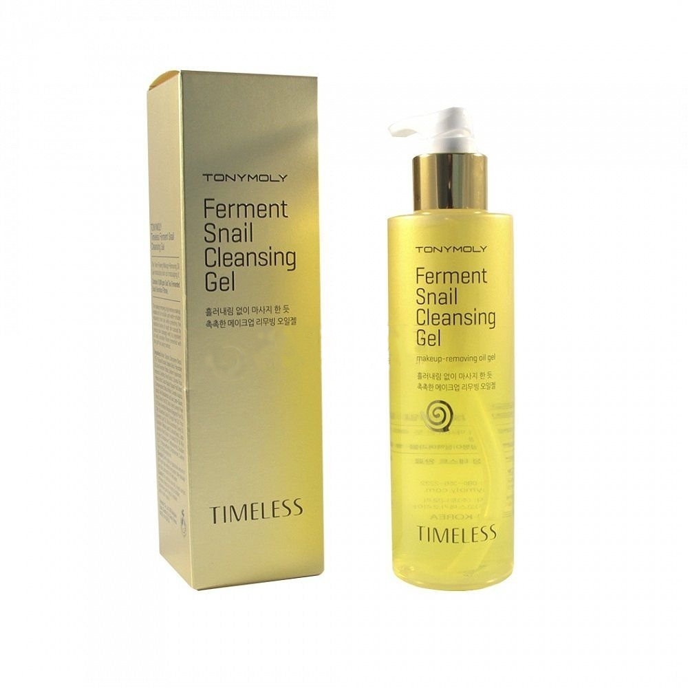 TonyMoly Очищающий гель для лица Timeless ferment snail cleansing gel, 200 грFS-36054 TonyMoly Очищающий гель для лица Timeless ferment snail cleansing gel, 200 грFS-36054Гель улиточный из линии премиум класса от Tonymoly мягко и эффективно очищает кожу от всех видов загрязнений, накапливающихся в течение дня. Маслянистая текстура геля также сравнима по свойствам с гидрофильным маслом. Гель удаляет даже самый стойкий макияж, в том числе тональные основы, бб/сс-крем и пр.После использования геля кожа чистая и ухоженная, светится лоском и свежестью. Средство предотвращает воспаления и раздражения, а также неприятные черные точки и закупоренные поры.Основа масла - экстракт улитки. Это слизь, которую производит улитка для восстановления поврежденных участков своего тела, именно поэтому это вещество обладает очень мощным восстанавливающим и омолаживающим действием, причем кожа человека очень хорошо его воспринимает, принимая за свое.Муцин улитки действует по нескольким направлениям:-увлажняет-питает-обеззараживает-омолаживает-заживляет-тонизирует-разглаживает кожу-наполняет жизненной силой-придает бархатистость