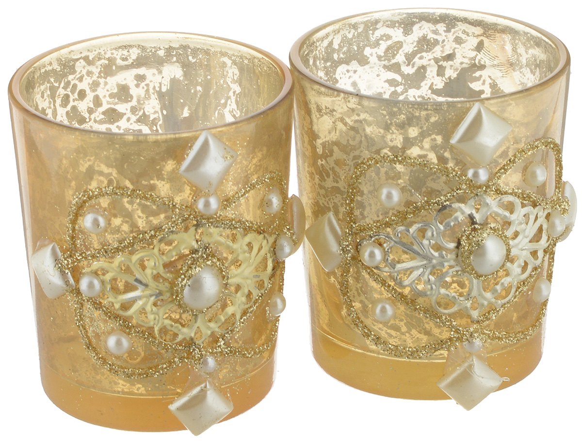 Набор подсвечников Lovemark, цвет: золотистый, 5,5 х 5,5 х 6,5 см, 2 штPARIS 75015-8C ANTIQUE Набор подсвечников Lovemark, цвет: золотистый, 5,5 х 5,5 х 6,5 см, 2 штPARIS 75015-8C ANTIQUEНабор Lovemark представляют собой стеклянные емкости для чайной свечи, оформленные изысканными декоративным элементами в виде жемчужин и блестками. Такие подсвечники элегантно оформят интерьер вашего дома, а мерцание свечи создаст атмосферу романтики и уюта. Диаметр емкости (по верхнему краю): 5,5 см. Высота емкости: 6,5 см.