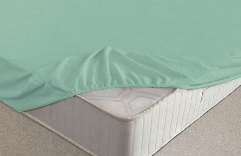 Простыня на резинке Ecotex, махровая, цвет: ментоловый, 180 х 200 см531-105 Простыня на резинке Ecotex, махровая, цвет: ментоловый, 180 х 200 см531-105Махровые простыни на резинке сшиты из высококачественного махрового полотна, окрашены стойкими экологически безопасными красителями. Они уже успели завоевать признание потребителей благодаря своим практичным характеристикам. Имеют резинку по всему периметру, что даёт возможность надежно зафиксировать простыню на матрасе, тем самым создавая здоровый и комфортный сон. Натяжные махровые простыни довольно практичны, т.к. махровое полотно долговечно. Выолнены из 100% хлопка и не содержат синтетических добавок.