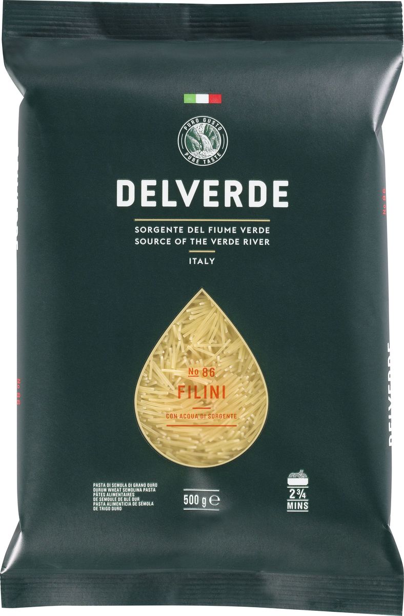 Delverde № 086 паста Филини, 500 г0120710 Delverde № 086 паста Филини, 500 г0120710Филини Delverde – тонкая паста, идеальна для приготовления супов.Варить в кипящей подсоленной воде 2,20 минуты. Компания Delverde Industrie Alimentari S.p.a начала свою историю в середине XX века в Фаре, доведя до совершенства искусство традиционного производство пасты. Традиция изготовления пасты в историческом поселении Фара Сан Мартино известна по всему миру с XVII века: именно здесь производители впервые научились искусству смешивать зерна пшеницы с чистейшей водой реки Верде. Фара Сан Мартино до сих пор славится как одна из мировых столиц пасты. С самого начала миссией компании было производить и предлагать миру высококачественные продукты из высококачественных ингредиентов. Компания Delverde до сих пор работает в соответствии с наилучшими итальянскими гастрономическими и промышленными традициями. Для приготовления пасты Delverde используются только отборные, отлично сочетающиеся друг с другом ингредиенты: чистейшая вода из реки Верде и зерна самой качественной твердой пшеницы.