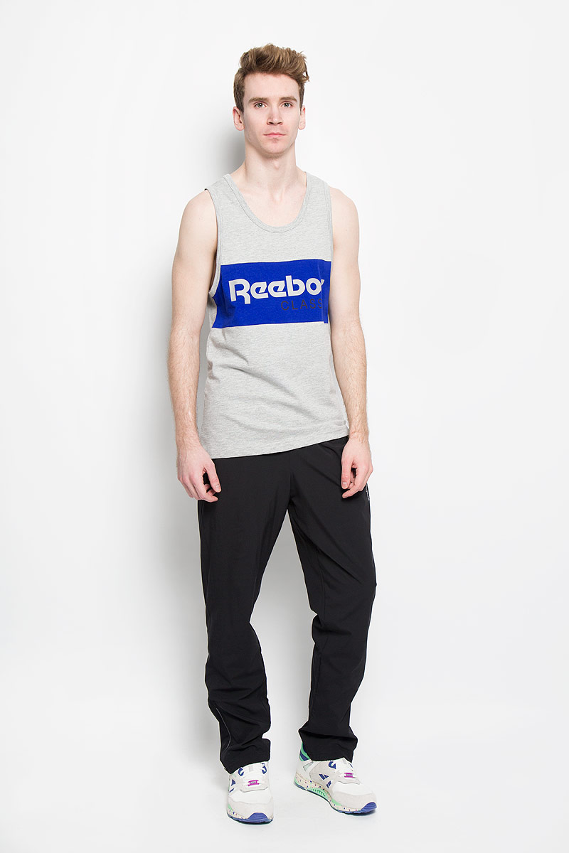 Майка мужская Reebok F Archive Stripe Tank, цвет: серый меланж. AK0568. Размер XL (56/58)AK0568 Майка мужская Reebok F Archive Stripe Tank, цвет: серый меланж. AK0568. Размер XL (56/58)AK0568Стильная мужская майка Reebok F Archive Stripe Tank обеспечивает наибольший комфорт и свободу движений во время занятий спортом и в повседневной жизни. Сочетающая в себе свободный крой и удобную круглую горловину, она подарит вам удобство и комфорт. 100% плотный хлопок обеспечивает оптимальный микроклимат. Модель декорирована термоаппликацией в виде надписи Reebok Classic. Такая майка послужит замечательным дополнением к вашему гардеробу.