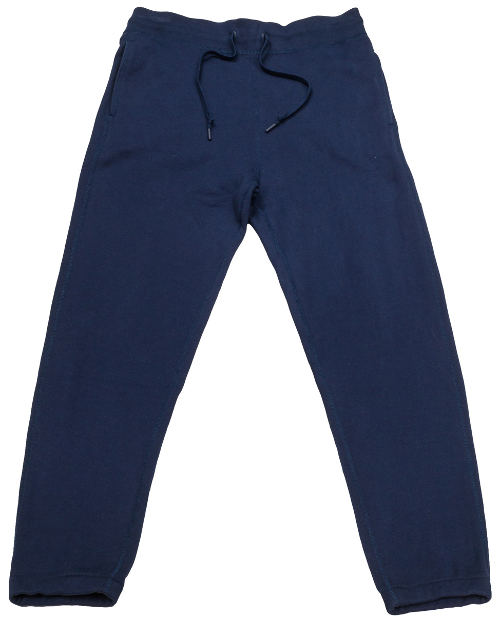 Брюки спортивные мужские Converse Sportswear Jogger, цвет: темно-синий. 10000657467. Размер L (50)10000657467 Брюки спортивные мужские Converse Sportswear Jogger, цвет: темно-синий. 10000657467. Размер L (50)10000657467Удобные мужские спортивные брюки Converse, выполненные из натурального хлопка, великолепно подойдут для отдыха, повседневной носки, а также для занятий спортом. Модель прямого кроя и средней посадки имеет широкую эластичную резинку на поясе, объем талии регулируется при помощи шнурка-кулиски. Спереди изделие имеет два втачных кармана, сзади один накладной.
