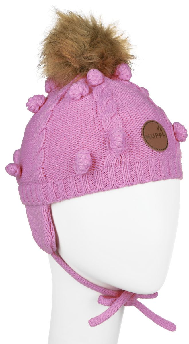Шапка для девочки Huppa Macy, цвет: розовый. 83570000-60013. Размер 47/4983570000-60013 Шапка для девочки Huppa Macy, цвет: розовый. 83570000-60013. Размер 47/4983570000-60013Вязанная детская шапочка Huppa Macy станет отличным дополнением к детскому гардеробу. Верх изделия изготовлен из 100% акрила, а подкладка из качественного хлопка, что обеспечивает тепло икомфорт. Благодаря эластичной вязке, шапка идеально прилегает к голове ребенка.Шапка оформлена вязанным узором, на макушке модель имеет мягкий меховой помпон. Изделие завязывается на шнурочки, пришитые сбоку к удлиненным ушкам, тем самым обеспечивает тепло в холодную погоду и защищает детские ушки от холода. Дополнена шапочка нашивкой с названием бренда. Оригинальный дизайн и расцветка делают эту шапку стильным предметом детского гардероба. В ней ребенку будет тепло, уютно и комфортно. Уважаемые клиенты!Размер, доступный для заказа, является обхватом головы.