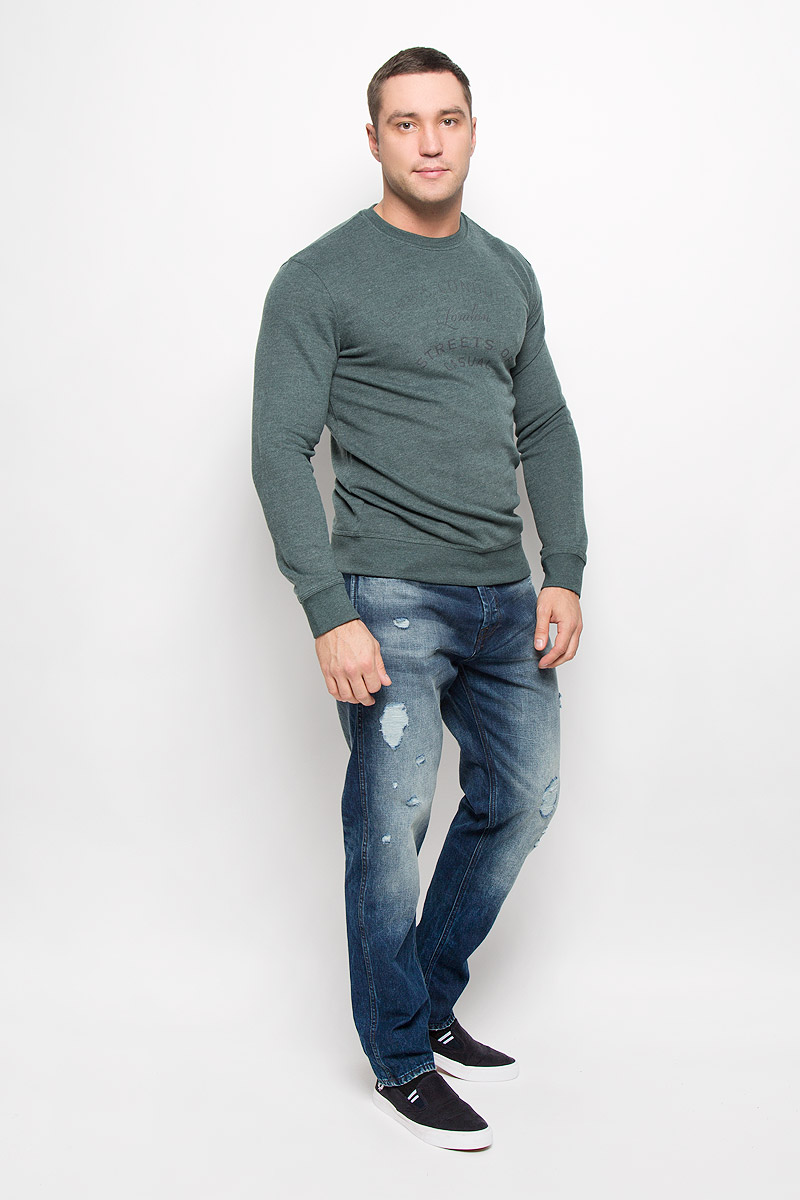 Свитшот мужской Selected Homme Heritage, цвет: темно-зеленый меланж. 16051414. Размер XL (50)16051414_Green Gables Свитшот мужской Selected Homme Heritage, цвет: темно-зеленый меланж. 16051414. Размер XL (50)16051414_Green GablesМужской свитшот Selected Homme Heritage, выполненный из хлопка с добавлением полиэстера, идеально подойдет для повседневной носки. Материал очень мягкий, тактильно приятный, не сковывает движения и хорошо пропускает воздух. Изнаночная сторона с небольшими петельками. Свитшот с круглым вырезом горловины и длинными рукавами оформлен принтовыми надписями. Вырез горловины и низ изделия дополнены трикотажной резинкой. На рукавах предусмотрены широкие манжеты.Современный дизайн и отличное качество делают этот свитшот стильным и практичным предметом мужской одежды. Такая модель подарит вам комфорт в течение всего дня!