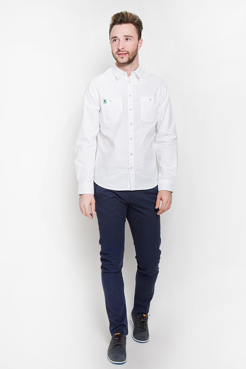 Рубашка мужская Sela Casual Wear, цвет: белый. H-212/710-6332. Размер 40 (46)H-212/710-6332 Рубашка мужская Sela Casual Wear, цвет: белый. H-212/710-6332. Размер 40 (46)H-212/710-6332Стильная мужская рубашка Sela Casual Wear, выполненная из натурального хлопка, подчеркнет ваш уникальный стиль и поможет создать оригинальный образ. Такой материал великолепно пропускает воздух, обеспечивая необходимую вентиляцию, а также обладает высокой гигроскопичностью. Рубашка с длинными рукавами и отложным воротником застегивается на пуговицы спереди. Модель дополнена двумя нагрудными карманами на пуговицах. Манжеты рукавов также застегиваются на пуговицы. Рубашка оформлена мелким принтом в виде силуэтов пришельцев. Классическая рубашка - превосходный вариант для базового мужского гардероба и отличное решение на каждый день.Такая рубашка будет дарить вам комфорт в течение всего дня и послужит замечательным дополнением к вашему гардеробу.