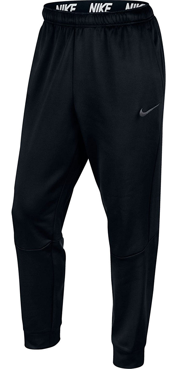 Брюки спортивные мужские Nike M Thrma Pant Taper, цвет: черный. 800193-010. Размер XL (54/56)800193-010 Брюки спортивные мужские Nike M Thrma Pant Taper, цвет: черный. 800193-010. Размер XL (54/56)800193-010Брюки Nike M NK Therma выполнены из ткани Therma надежно защищают от холода. Зауженные к лодыжкам штанины плотно облегают ноги, а эластичный пояс обеспечивает комфортную посадку.