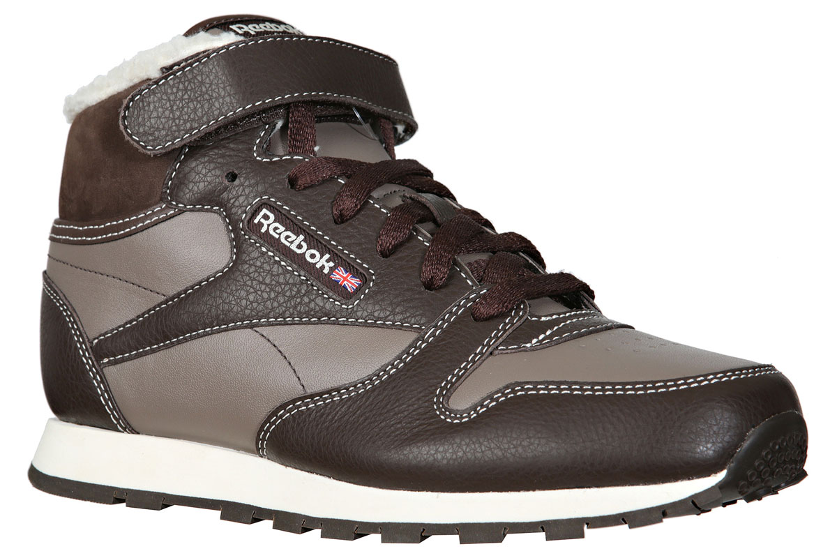Кроссовки детские Reebok Cl Lthr Mid Strap, цвет: коричневый. M46338. Размер 4,5 (36,5)M46338 Кроссовки детские Reebok Cl Lthr Mid Strap, цвет: коричневый. M46338. Размер 4,5 (36,5)M46338Утепленные кроссовки Reebok Cl Lthr Mid Strap выполнены из натурального спилка, подкладка из искусственного меха, текстильная стелька. Детали: удобная функциональная шнуровка, кожаные вставки, анатомическая стелька и промежуточная подошва из ЭВА амортизируют ударную нагрузку. Уникальный рисунок протектора подошвы обеспечивает непревзойденное сцепление.