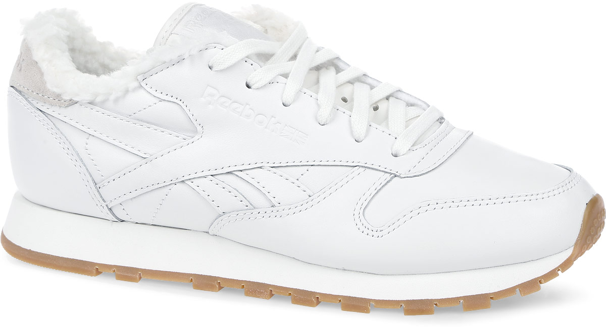 Кроссовки женские Reebok CL Leather Sherpa, цвет: белый. BD1283. Размер 9,5 (41)BD1283 Кроссовки женские Reebok CL Leather Sherpa, цвет: белый. BD1283. Размер 9,5 (41)BD1283Снег и слякоть будут нипочем в кроссовках Cl Leather Sherpa от Reebok. Они позаботятся о том, чтобы вашим ногам было тепло и сухо. Зимняя модель классического силуэта с подкладкой из стриженой овчины защитит от любых капризов природы, а система двойной амортизации подарит комфорт.Модель выполнена из натуральной кожи с перфорацией. Промежуточная подошва из пеноматериала эффективно поглощает энергию удара. Стойкая к истиранию резиновая подошва отличается высокой прочностью и отличным сцеплением. Классическая шнуровка надежно фиксирует модель на ноге. Низкий дизайн гарантирует еще большую свободу движений.