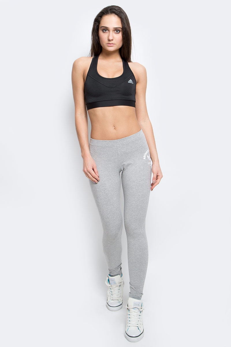 Топ-бра для фитнеса adidas Performance Tf Bra Solid, цвет: черный. AJ2172. Размер L (48/50)AJ2172 Топ-бра для фитнеса adidas Performance Tf Bra Solid, цвет: черный. AJ2172. Размер L (48/50)AJ2172Спортивный топ-бра adidas Performance Tf Bra Solid, выполненный из высококачественного эластичного полиэстера, обеспечивает средний уровень поддержки. Вентиляционная система Climacool отводит излишки тепла и усиливает циркуляцию воздуха. Выполнен из экологически чистых материалов. Крой с технологией Techfit фокусирует энергию мышц, обеспечивая максимальную силу отдачи, ускорение и выносливость Модель на не регулируемых по длине бретелях имеет широкий эластичный пояс, который обеспечивает бережную поддержку. Широкие бретельки и спинка-борцовка надежно фиксируют топ на плечах.