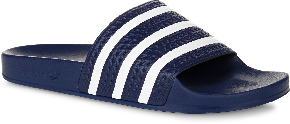 Шлепанцы мужские adidas Adilette, цвет: темно-синий, белый. 288022. Размер 11 (44,5)288022 Шлепанцы мужские adidas Adilette, цвет: темно-синий, белый. 288022. Размер 11 (44,5)288022Шлепанцы adidas Adilette выполнены из полимера и оформлены декоративным тиснением. Подкладка из текстиля комфортна при носке. Подошва изготовлена извысококачественного легкого ЭВА-материала. Верхняя часть подошвы SUPERCLOUD PLUS обеспечивает максимальный комфорт стоп и отличную амортизацию. Поверхность подошвы дополнена рельефным рисунком.