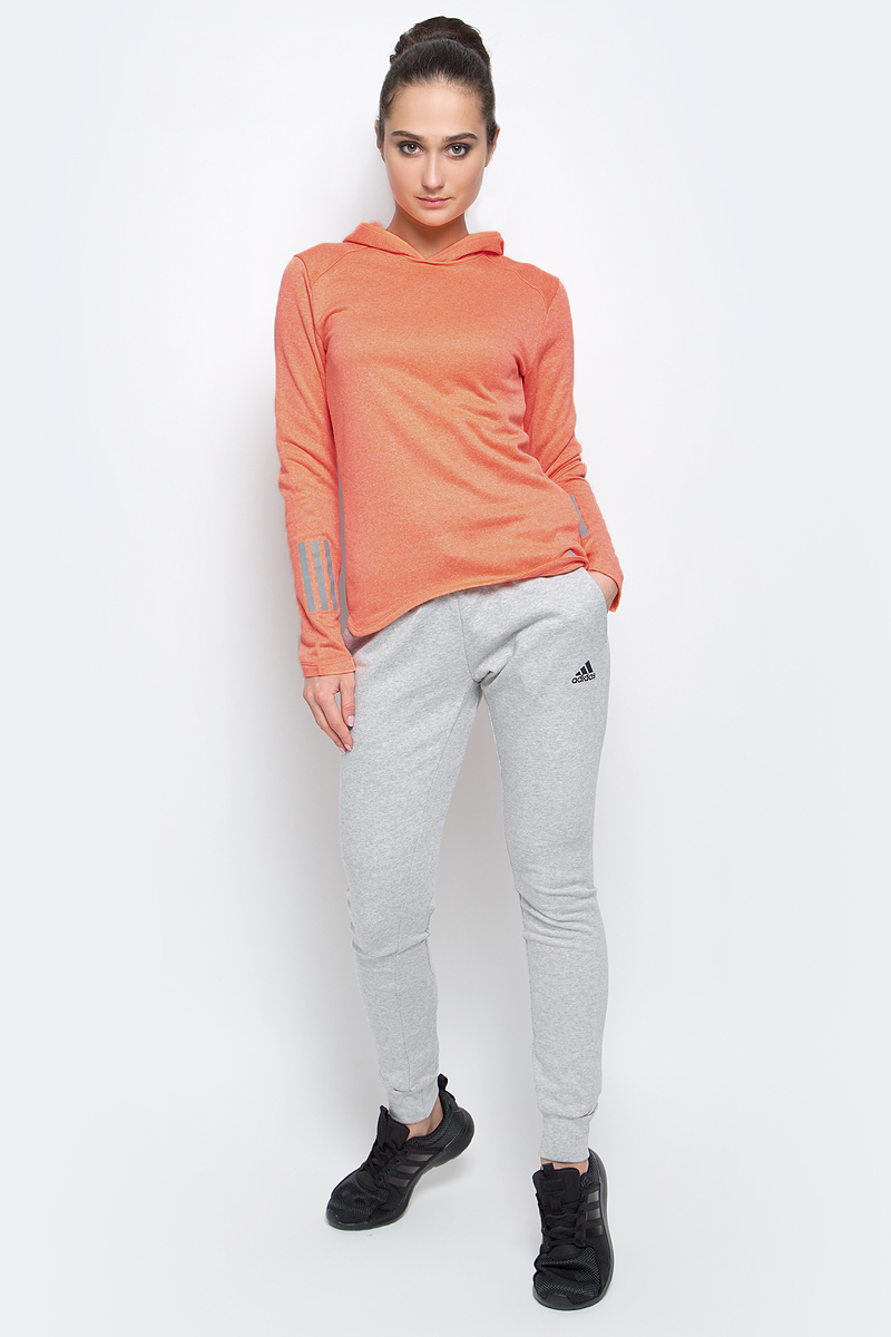 Худи женское adidas Rs Astro Hood W, цвет: ярко-персиковый. BK3160. Размер S (42/44)BK3160 Худи женское adidas Rs Astro Hood W, цвет: ярко-персиковый. BK3160. Размер S (42/44)BK3160Худи adidas RS ASTRO HOOD W выполнено из быстросохнущего мягкого флиса. С внутренней стороны модель дополнена теплой подкладкой. Ткань с технологией climalite® быстро и эффективно отводит влагу с поверхности кожи, поддерживая комфортный микроклимат. Худи с капюшоном и длинными рукавами оформлено светоотражающими деталями и надписью бренда. Манжеты на рукавах дополнены прорезями для больших пальцев.