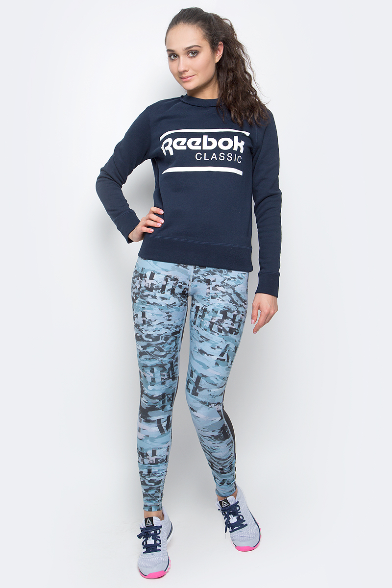 Свитшот женский Reebok F Iconic Crew Sweat, цвет: темно-синий. BK2408. Размер S (42/44)BK2408 Свитшот женский Reebok F Iconic Crew Sweat, цвет: темно-синий. BK2408. Размер S (42/44)BK2408Свитшот F Iconic Crew Sweat от Reebok выполнен из мягкой хлопковой ткани. Плоские швы сводят к минимуму риск натирания. У модели круглый ворот, манжеты и подол на резинке в рубчик для оптимальной посадки. Ворот дополнен оригинальной окантовкой. Спереди изделие декорировано принтом в виде логотипа бренда.