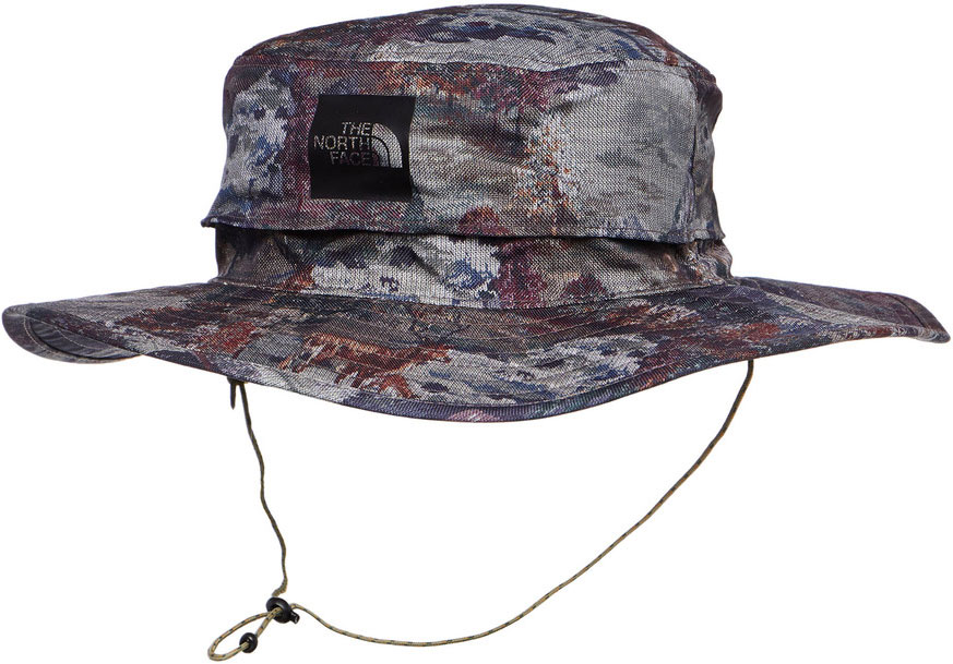 Панама The North Face Homestead Br, цвет: мультиколор. T92SBVRZX. Размер L/XL (58/59)T92SBVRZX Панама The North Face Homestead Br, цвет: мультиколор. T92SBVRZX. Размер L/XL (58/59)T92SBVRZXЛегкая летняя панама The North Face выполнена из качественной смесовой ткани. Панама оформлена надписью с названием бренда и дополнена завязками.