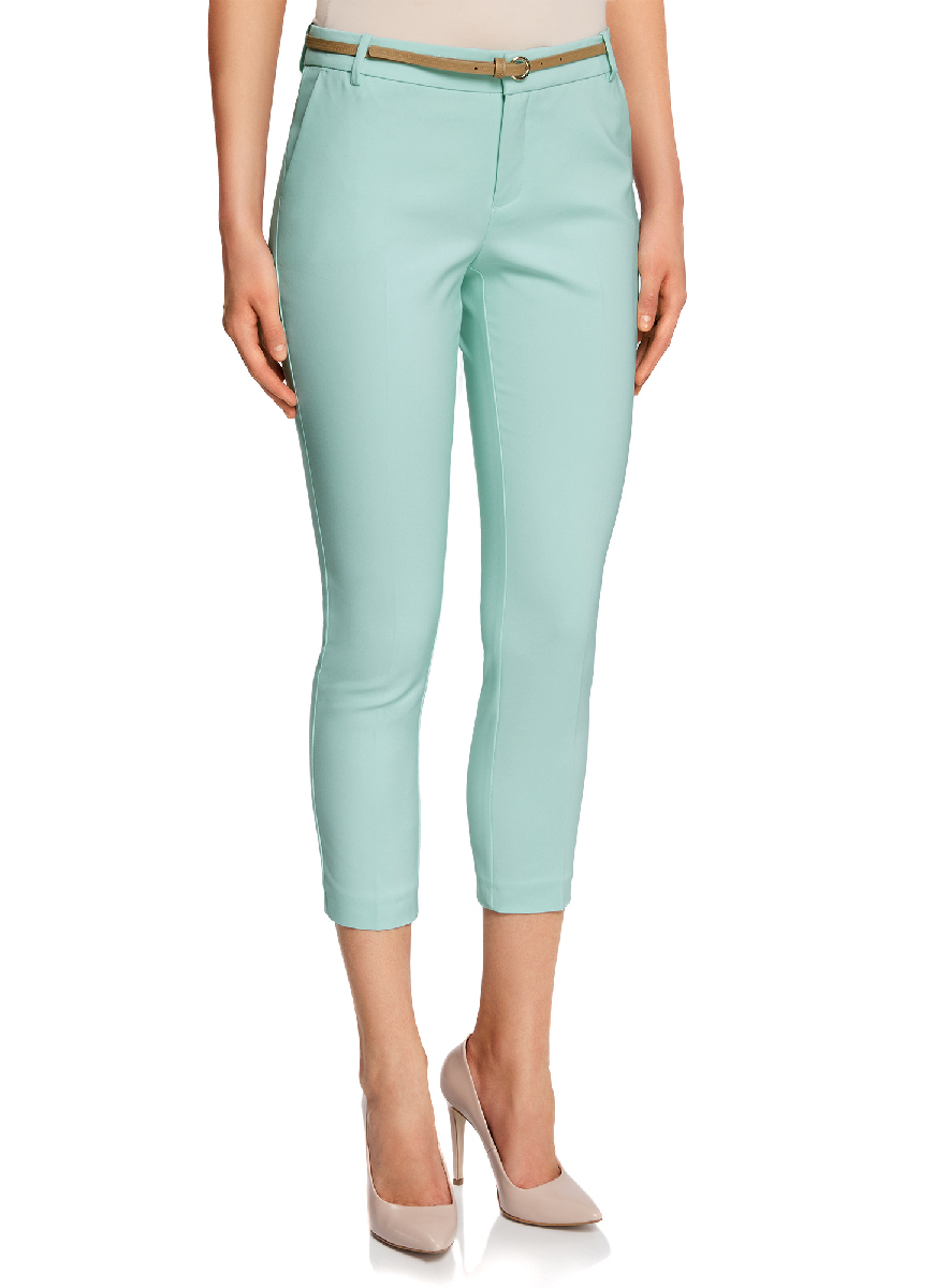 Брюки женские oodji Collection, цвет: ментоловый. 21701094/33574/6500N. Размер 42-170 (48-170)21701094/33574/6500N Брюки женские oodji Collection, цвет: ментоловый. 21701094/33574/6500N. Размер 42-170 (48-170)21701094/33574/6500NЖенские укороченные брюки oodji Collection выполнены из высококачественного материала. Зауженная модель стандартной посадки застегивается на пуговицу в поясе и ширинку на застежке-молнии. Пояс имеет шлевки для ремня. Спереди брюки дополнены втачными карманами, сзади - прорезными на пуговицах. К модели прилагается ремешок.