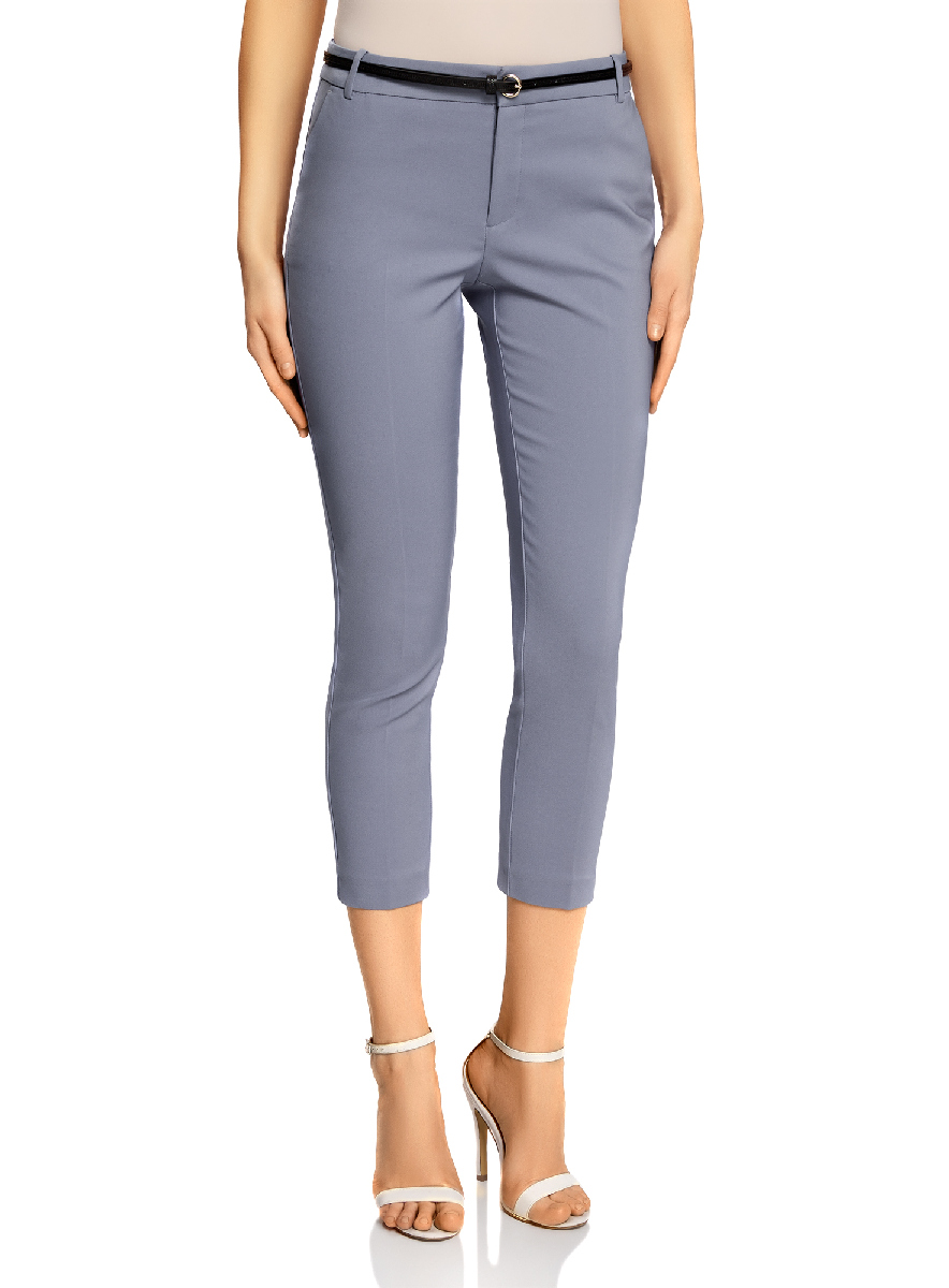 Брюки женские oodji Collection, цвет: голубой. 21701094/33574/7001N. Размер 40-170 (46-170)21701094/33574/7001N Брюки женские oodji Collection, цвет: голубой. 21701094/33574/7001N. Размер 40-170 (46-170)21701094/33574/7001NЖенские укороченные брюки oodji Collection выполнены из высококачественного материала. Зауженная модель стандартной посадки застегивается на пуговицу в поясе и ширинку на застежке-молнии. Пояс имеет шлевки для ремня. Спереди брюки дополнены втачными карманами, сзади - прорезными на пуговицах. К модели прилагается ремешок.