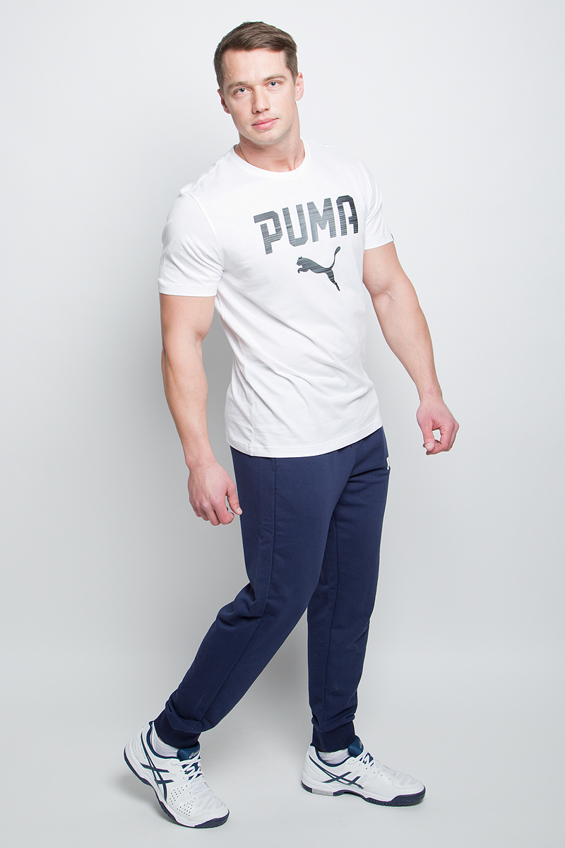 Футболка мужская Puma Rebel Tee, цвет: белый. 590605_02. Размер L (50/52)590605_02 Футболка мужская Puma Rebel Tee, цвет: белый. 590605_02. Размер L (50/52)590605_02Футболка мужская Rebel Tee изготовлена из 100% хлопка с финальной влагоотводящей обработкой на биологической основе. Изделие имеет классический крой, круглый вырез горловины и короткие рукава. Ворот выполнен из трикотажа в рубчик. Футболка декорирована спереди набивным рисунком c прорезиненными деталями. Даже самая прочная и выносливая одежда вряд ли будет более комфортной, чем PUMA Rebel Tee. Модель подойдет для прогулок и занятий спортом, имеет удобный силуэт, который подходит для любого телосложения.