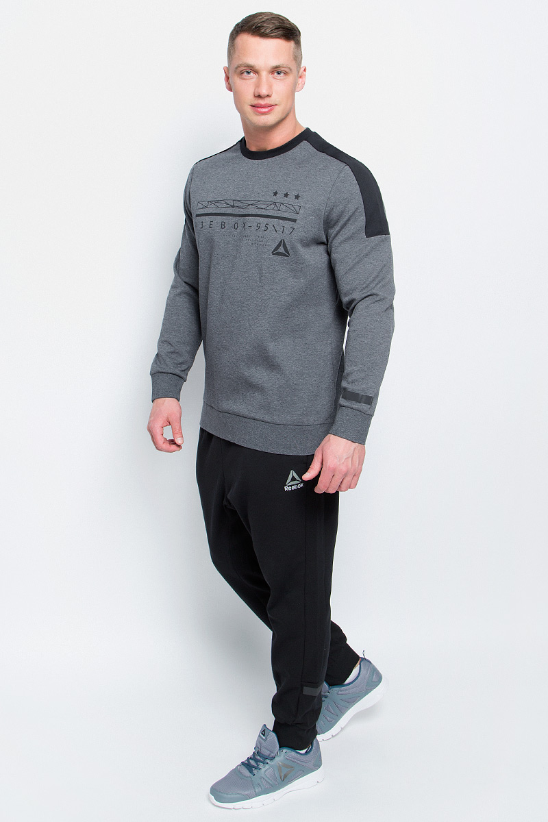 Свитшот мужской Reebok Wor C Graphic Crew, цвет: серый. BK4713. Размер M (48/50)BK4713 Свитшот мужской Reebok Wor C Graphic Crew, цвет: серый. BK4713. Размер M (48/50)BK4713Мужской свитшот Reebok Wor C Graphic Crew, выполненный из хлопка с добавлением полиэстера, идеально подойдет для повседневной носки и занятий спортом. Свитшот с круглым вырезом горловины и длинными рукавами оформлен оригинальным принтом с надписями. На рукавах предусмотрены широкие манжеты. Низ изделия дополнен трикотажной резинкой.