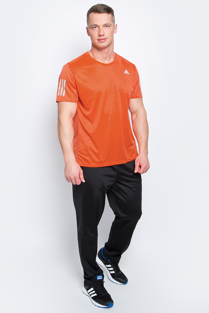 Футболка для бега мужская adidas Rs Ss Tee M, цвет: оранжевый. BP7427. Размер M (48/50)BP7427 Футболка для бега мужская adidas Rs Ss Tee M, цвет: оранжевый. BP7427. Размер M (48/50)BP7427Мужская спортивная футболка Adidas Rs Ss Tee M изготовлена из полиэстера с добавлением полиэфира по технологии climalite, что обеспечивает быстрое влагоотведение с поверхности тела. Модель с круглой горловиной и короткими рукавами. Однотонная футболка декорирована принтом с логотипом бренда и светоотражающими полосами на рукавах.