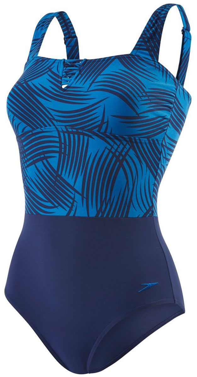 Купальник слитный Speedo LunaDream Printed 1 Piece, цвет: темно-синий. 8-10834B355-B355. Размер 38 (50/52)8-10834B355-B355 Купальник слитный Speedo LunaDream Printed 1 Piece, цвет: темно-синий. 8-10834B355-B355. Размер 38 (50/52)8-10834B355-B355Женственный купальник Speedo LunaDream Printed 1 Piece с контрастными принтованным вставками в верхней части изделия дарит абсолютную свободу движений и комфорт во время плавания. Модель сконструирована таким образом, чтобы подчеркнуть женственную натуральную форму груди и скорректировать линию талии. Благодаря волокнам ExtraLifeLycra, ткань более устойчива к разрушающему воздействию хлора, чем обычные ткани с эластаном и спандексом. SpeedoSculpture обеспечивает поддержку груди и живота, формируя изящный силуэт. Моделирующий эффект конструкции создается не только за счет специального кроя, но и благодаря свойствам самого материала - таким образом, купальник отнюдь не стягивает корпус, а напротив - дарит абсолютную свободу движений, и ощущается настолько комфортно, словно вторая кожа. Регулируемые лямки гарантируют удобную посадку и комфорт при любых видах активности в воде. Конструкция модели предусматривает низкую линию выреза бедра.