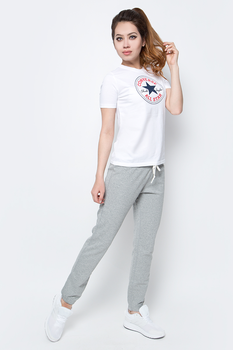 Брюки спортивные женские Converse Knitted Pant, цвет: серый. 10003924035. Размер L (48)10003924035 Брюки спортивные женские Converse Knitted Pant, цвет: серый. 10003924035. Размер L (48)10003924035Женские спортивные брюки Converse изготовлены из натурального хлопка. Модель на широкой эластичной резинке и шнурке на талии. Низы брючин дополнены резинками. Такие брюки незаменимая вещь в спортивном и летнем гардеробе. Прекрасный выбор для занятий фитнесом или активного отдыха.