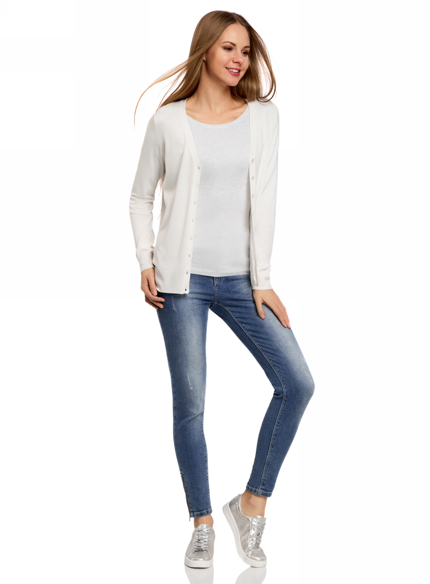 Жакет женский oodji Collection, цвет: белый. 73212151-9B/45904/1200N. Размер XS (42)73212151-9B/45904/1200N Жакет женский oodji Collection, цвет: белый. 73212151-9B/45904/1200N. Размер XS (42)73212151-9B/45904/1200NТрикотажный жакет oodji изготовлен из качественного смесового материала. Модель с длинными рукавами застегивается на пуговицы по всей длине. Низ изделия и рукава выполнены с эластичными резинками.