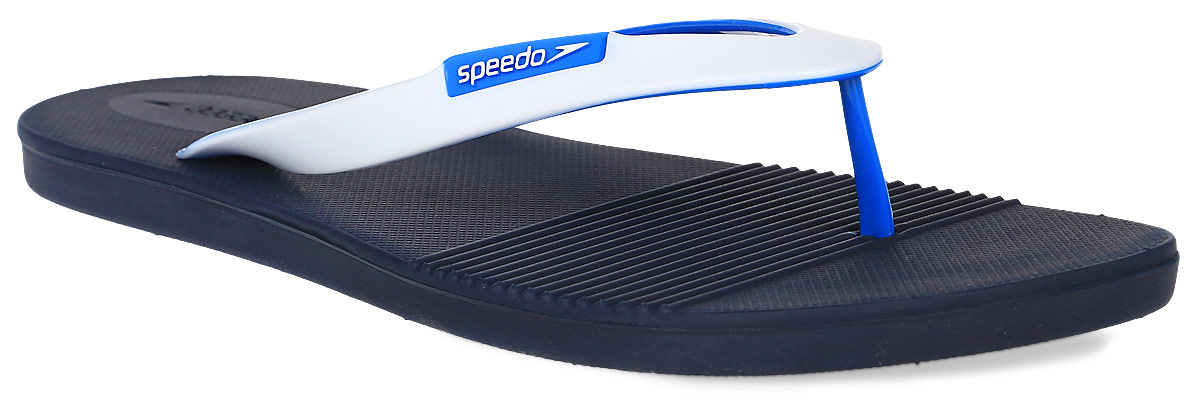 Сланцы мужские Speedo Saturate II Thong, цвет: темно-синий, белый. 8-090613623-3623. Размер 10 (44,5)8-090613623-3623 Сланцы мужские Speedo Saturate II Thong, цвет: темно-синий, белый. 8-090613623-3623. Размер 10 (44,5)8-090613623-3623Мужские сланцы Saturate II Thong от Speedo выполнены из термополиуретана. Ремешки с перемычкой, декорированные логотипом бренда, фиксируют изделие на ноге. Подошва выполнена из этилвинилацетата. Рельефная поверхность верхней части подошвы комфортна при движении. Основание подошвы дополнено рифлением.