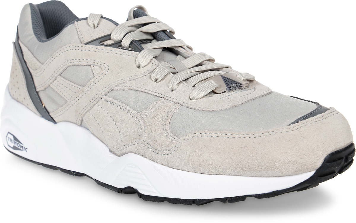 Кроссовки мужские Puma R698, цвет: светло-серый. 36257002. Размер 9 (42)36257002 Кроссовки мужские Puma R698, цвет: светло-серый. 36257002. Размер 9 (42)36257002В этом сезоне Puma вернулась к обновленной модели R698, которая всегда удачно дополняла коллекцию популярной беговой обуви Trinomic. Взяв за основу проверенную подошву Trinomic, специалисты Puma оживили легендарный дизайн чистыми и простыми цветами, выбранными для этого сезона, а также накладкой из материала с мелкой перфорацией в области задника, чтобы новая версия смотрелась еще более привлекательно. Рельефная поверхность подошвы гарантируют отличное сцепление на любых поверхностях. Традиционная шнуровка вместе с мягким язычком обеспечивает надежную фиксацию ноги. В таких кроссовках вашим ногам будет комфортно и уютно.