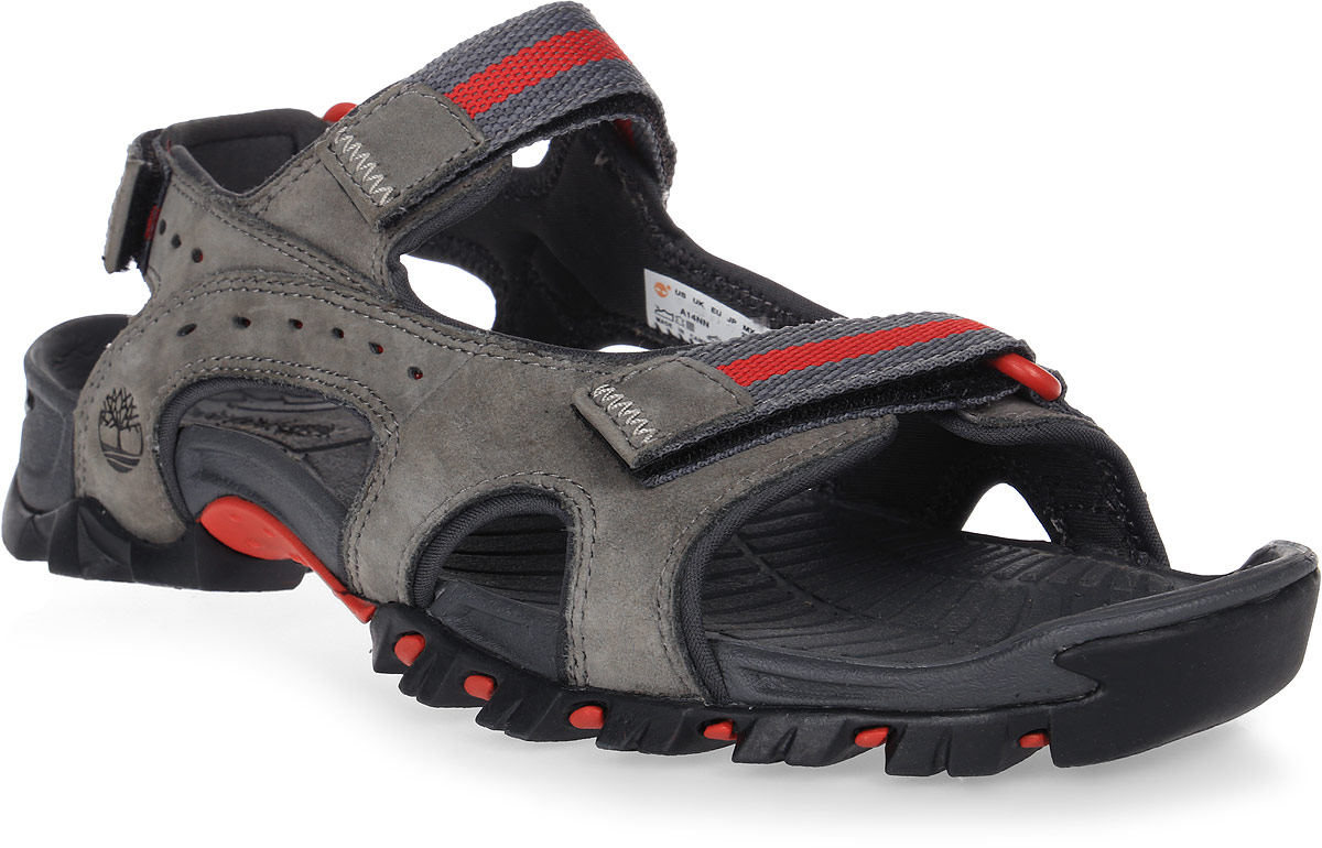 Сандалии мужские Timberland Wakeby Sandal, цвет: серый. TBLA14NNM. Размер 7 (39)TBLA14NNM Сандалии мужские Timberland Wakeby Sandal, цвет: серый. TBLA14NNM. Размер 7 (39)TBLA14NNMСтильные мужские сандалии Timberland Wakeby Sandal станут неотъемлемой частью повседневной жизни человека, любящего прогулки и приключения.Модель выполнена из натуральной кожи с подкладкой из высококачественного текстиля. Стелька изготовлена из компрессионного формованного EVA-материала, который обеспечивает долгосрочную амортизацию и оказывает поддержку стопе. Классические липучки быстро и надежно фиксируют обувь на ноге, а формованный задник обеспечивает правильную установку стопы внутри обуви.Рифленая подошва из резины обладает высокой прочностью и гибкостью и обеспечивает надежное сцепление с различными поверхностями. Уникальная система амортизации обеспечивает хорошую гибкость и быстро реагирует на изменения поверхности: при прогулке такая обувь гарантирует устойчивость, делая перепады рельефа менее ощутимыми.