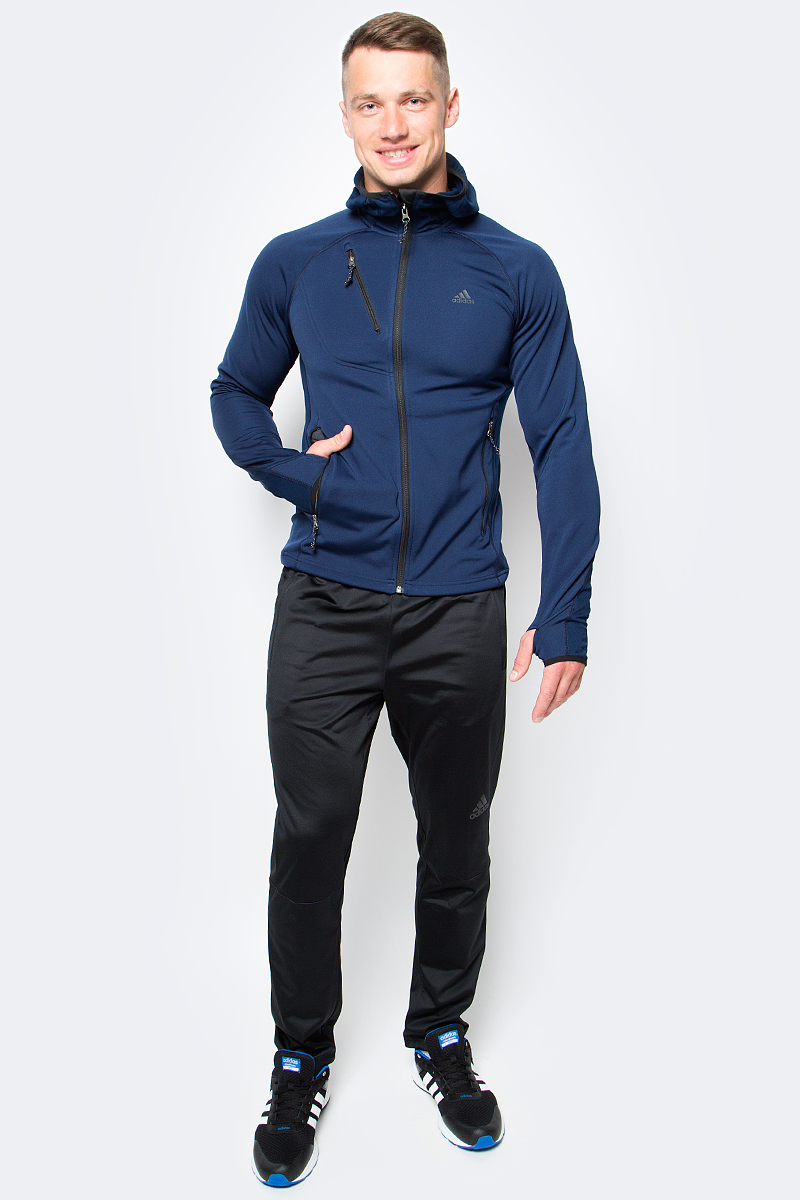 Толстовка мужская adidas M Bloc Ho FL, цвет: темно-синий. AP8385. Размер 50AP8385 Толстовка мужская adidas M Bloc Ho FL, цвет: темно-синий. AP8385. Размер 50AP8385Эта мужская толстовка для пешего туризма выполнена из дышащего материала climawarm, который эффективно сохраняет тепло и поддерживает оптимальный микроклимат. Махровый флис создает ощущение невероятной мягкости и комфорта. Облегающий капюшон и нижний край на завязках защищают от холода, а рукава с отверстиями для больших пальцев согревают руки. Передние карманы на молниях, диагональный карман на молнии справа на груди. Эта модель - часть экологической программы adidas: использованы технологии, сберегающие природные ресурсы; каждая нить имеет значение: переработанный полиэстер сохраняет природные ресурсы и уменьшает отходы производства.
