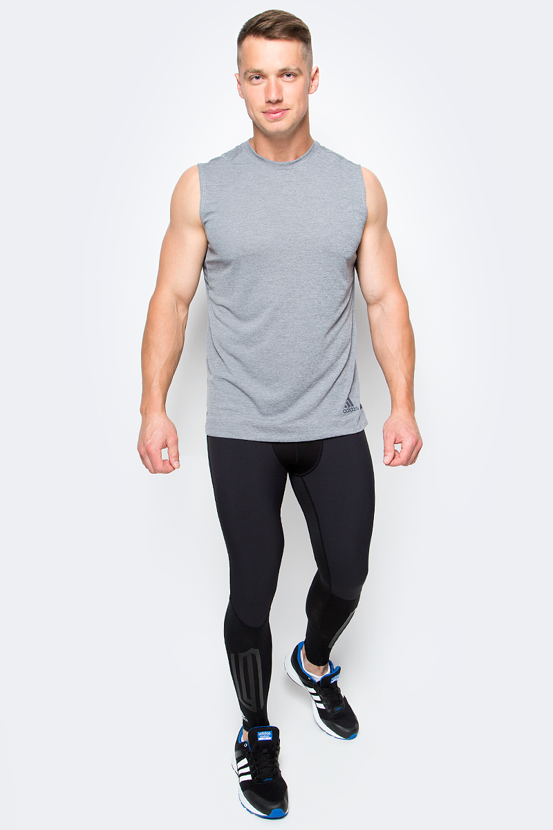 Майка мужская Adidas, цвет: темно-серый. B45912. Размер XXL (60/62)B45912 Майка мужская Adidas, цвет: темно-серый. B45912. Размер XXL (60/62)B45912Внеси разнообразие в свои пробежки с майкой от Adidas. Материал майки эффективно отводит излишки влаги. Светоотражающие полосы спереди и сзади сделает вас различимым на дороге в темное время суток.Шов ворота обработан текстильной бейкой.