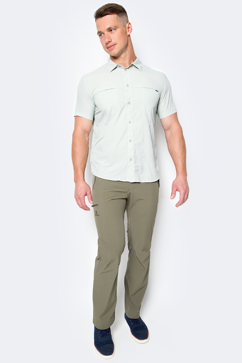 Брюки спортивные мужские Salomon Wayfarer Pant, цвет: коричневый. L39313200. Размер 54-32L39313200 Брюки спортивные мужские Salomon Wayfarer Pant, цвет: коричневый. L39313200. Размер 54-32L39313200Один взгляд на брюки Salomon Wayfarer Pant расскажет вам целую историю. Ощущение тепла и призрачный запах пыли вызовут в памяти прошлые приключения и пройденные дороги. Вас охватят мечты о новых путешествиях. Модель застегивается на кнопку в поясе и ширинку на молнии. На поясе по бокам имеются хлястики на липучках. Спереди и сзади расположены прорезные карманы на молниях. Брюки Wayfarer: прочный материал, непринужденный стиль. Они созданы для вас.