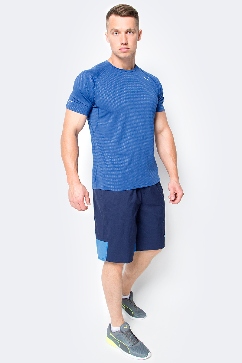 Футболка для бега мужская Puma Speed S/S Tee, цвет: синий. 51499503. Размер S (44/46)51499503 Футболка для бега мужская Puma Speed S/S Tee, цвет: синий. 51499503. Размер S (44/46)51499503Футболка Speed S/S Tee изготовлена с использованием высокофункциональной технологии dryCELL, которая отводит влагу, поддерживает тело сухим и гарантирует комфорт во время активных тренировок и занятий спортом. Она скроена таким образом, чтобы в местах наибольшего натяжения во время бега или активных движений появлялись прорези для улучшения вентиляции, отводящие от тела излишнее тепло. В то же время благодаря передовой технологии Thermo-R при переходе на шаг или остановке эти прорези закрываются, и вы не переохлаждаетесь. Плоские швы не натирают кожу и обеспечивают непревзойденный комфорт. Рукава-реглан обеспечивают полную свободу движений. Удлиненный задний подол не задирается и закрывает поясницу. Футболка декорирована спереди и сзади логотипом и другими элементами из переливающегося светоотражающего материала, благодаря чему вас хорошо видно с любого ракурса в темное время суток.