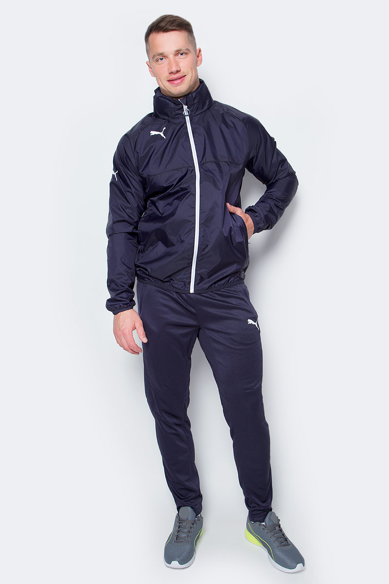 Ветровка мужская Puma Rain Jacket, цвет: темно-синий. 653968061. Размер S (44/46)653968061 Ветровка мужская Puma Rain Jacket, цвет: темно-синий. 653968061. Размер S (44/46)653968061Мужская ветровка Rain Jacket от Puma выполнена из высококачественного нейлона. Модель с длинными рукавами и воротником-стойка застегивается на застежку-молнию. По бокам расположены прорезные карманы.
