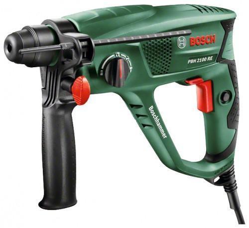 Bosch PBH2100 SRE0.603.3А9.321 Перфоратор РВН 2100 SRE Bosch PBH2100 SRE0.603.3А9.321 Перфоратор РВН 2100 SREДомашний помощникПроизводитель ручного инструмента Bosch создал модель РВН 2100 SRE для использования как в быту, так и на производстве. Перфоратор предназначен для создания отверстий в металле, в дереве и других твердых материалах. А если переключиться в режим «завинчивание» инструмент превращается в обычный шуруповерт, которым можно вкручивать саморезы.Отличная производительностьПри относительно не сложных видах работ, а также при эксплуатации инструмента на высоте вам необходим сравнительно легкий и производительный перфоратор. Именно таким является РВН 2100 SRE от производителя Bosch. Весом 2.2 кг, он снабжен мощным двигателем 550 Вт и длинным сетевым кабелем 2.2 м. Модель имеет функцию удара с энергией 1.5 Дж, частотой 5800 уд/мин., что делает его отличным «убийцей» бетона и кирпича.Долбить или сверлитьСамым популярным режимом большинства перфораторов является режим «сверления с ударом», при котором рабочая оснастка получает одновременно оборотные и поступательные движения, таким образом делая отверстие в твердых материалах.SDS-патронУниверсальный патрон SDS-Plus позволяет закрепить зубило (и другие насадки) в разных положениях и обеспечивает удобную работу в труднодоступных местах.Диаметры сверленияДля надежной долговечной работы инструмента всегда необходимо знать максимальные рекомендуемые диаметры сверления определенных типов материалов, для РВН 2100 SRE это: по дереву – 30 мм, по металлу – 13 мм, по бетону (кирпичу) – 20 мм.Полезные мелочиВ Bosch РВН 2100 SRE предусмотрен ряд дополнительных конструктивных решений для более удобной эксплуатации: ограничитель глубины, реверс, регулировка частоты вращения, предохранительная муфта, блокировка кнопки включения.