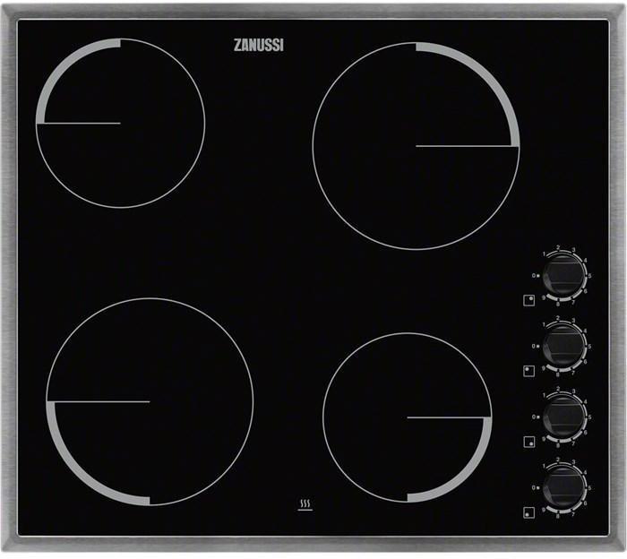 Zanussi ZEV 6140XBA варочная панель электрическаяZEV6140XBA Zanussi ZEV 6140XBA варочная панель электрическаяZEV6140XBAМеньше волнуйтесь за детей на кухне!Дети любопытны, и соблазн покрутить ручки и понажимать на кнопки для них непреодолим. Однако детям не удастся поиграть с элементами управления на этой варочной поверхности. Они расположены сбоку, а не спереди прибора, что значительно затрудняет доступ к ним маленьких пальчиков.Нагрев четко по габаритам ваших кастрюль и сковород.Когда размеры источника нагрева и оказавшейся на нем посуды соответствуют друг другу, приготовление упрощается, а его эффективность возрастает. Обзаведясь этой варочной панелью, вы быстро к этому привыкнете. Она оснащена конфорками двух разных размеров, которые подойдут множеству разнообразных кастрюль и сковород.Варочная поверхность, которая предупреждает вас, что она еще горячая!Отключение нагрева конфорки не означает, что ее сразу же можно касаться рукой! Индикатор остаточного тепла этой варочной поверхности предупреждает вас о том, что конфорка все еще горячая и позволяет избегать случайных травм. Недурная идея!Конфорки: Левая дальняя зона нагрева Hilight:Мощность / Диаметр 1200Вт / 145ммЛевая ближняя зона нагрева Hilight:Мощность / Диаметр 1800 Вт / 180 ммПравая дальняя зона нагрева Hilight:Мощность / Диаметр 1800Вт / 180ммПравая ближняя зона нагрева Hilight:Мощность / Диаметр 1200 Вт / 145 мм.Максимальная мощность подключения: 6000 Вт.