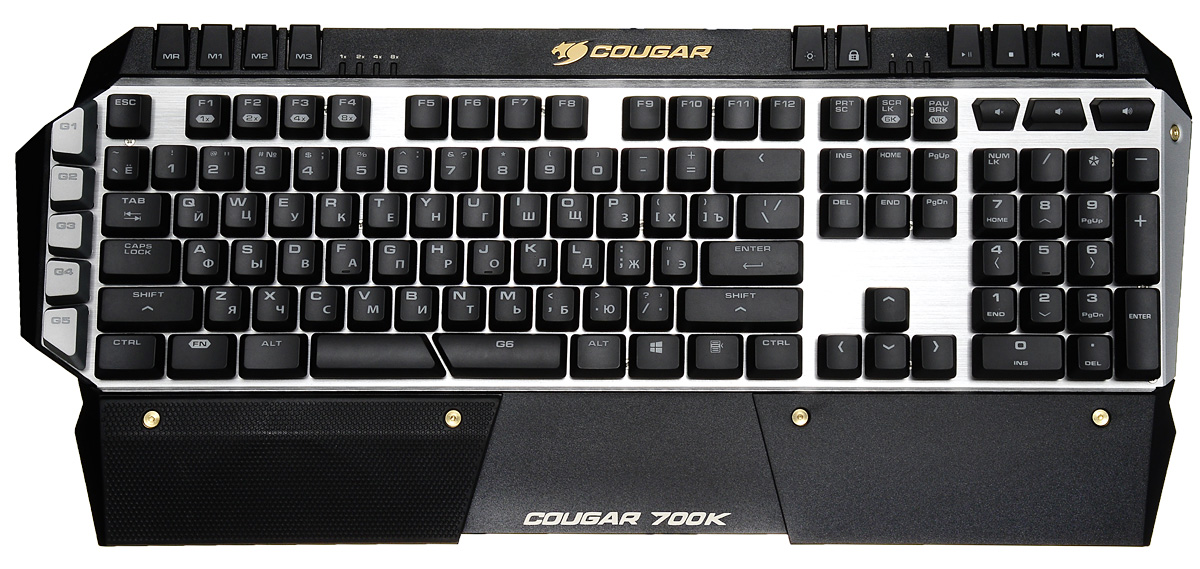 Cougar 700K, Black игровая клавиатураCU700K Cougar 700K, Black игровая клавиатураCU700KCougar 700K - это игровая механическая клавиатура премиум класса, предназначена для серьезных и профессиональных геймеров. Элементы геометрического фасета, используемые разработчиками в проектировании клавиатуры, создают впечатление схожести дизайна с военной технологией стелс. Ключевые механические модули клавиатуры размещены на открытой и изогнутой алюминиевой конструкции с матовой поверхностью. Такой дизайн создает максимальный комфорт пользователям при наборе текста, не говоря уже о крепкости и надежности конструкции. Покрытые пластиком края клавиатуры, предоставляют пользователям максимальную безопасность. Интуитивноерасположение клавиш и кнопок группировки аккуратно интегрированы в пластиковой конструкции. Это дает возможность концентрировать внимание геймеров на ключевые направления и позволяет им полностью сосредоточиться на своей игре. Дополнительная съемная панель для отдыха запястий обеспечивает хорошую эргономичную поддержку при работе с основными клавишами управления WASD.Переключатели Cherry MX:Механические клавиши обеспечивают оперативность, необходимую для клавиатуры игрового уровня, а также отличительные тактильные ощущения при ее использовании. Технология Cherry MX гарантирует длительное пользование клавиатурой с максимальным ресурсом до 50 миллионов нажатий.Система Cougar UIX:Интегрированное программное обеспечение объединяет все устройства Cougar в одном приложении.Независимо от того, являетесь ли вы новичком или профессиональным игроком, интуитивная операционная система клавиатуры позволяет легко настраивать и редактировать команды, а также обеспечивает пользователя всеми возможности для получения максимального удовольствия от игры.Алюминиевая матовая конструкция:Ключевые механические модули клавиатуры размещены на открытой и изогнутой алюминиевой конструкции с матовой поверхностью. Такой дизайн создает максимальный комфорт пользователям при наборе текста, не говоря уже о крепкости и надежности конструкции.Возможность регулирования скорости повтора 1X / 2X / 4X / 8X:COUGAR 700K позволяет быстро регулировать уровень скорости повтора для клавиатуры, что особенно полезно для игр, которые требуют постоянного повторного нажимания определенной клавиши.Подставка для рук FPS:Получите максимальный комфорт и улучшите свою производительность. Специально разработанная под FPS (а также и других игровых жанров) съемная резиновая опора для запястий обеспечивает надежный захват и правильную высоту для рук, таким образом геймерам не нужно прилагать дополнительных усилий для поддержки рук на одном уровне. Кроме того, опора способствует правильному положению рук для лучшего управления с помощью горячих клавиш.6 программируемых G-клавиш:6 программируемых G клавиш (5 на левой стороне клавиатуры и шестая справа от пробела) способствуют быстрому доступу к различным функциям. Абсолютно настраиваемые команды делают вашу жизнь проще, позволяя получить быстрый доступ именно к тем функциям, которые вы хотите, не используя при этом стандартные клавиши клавиатуры. Пять G клавиш на левой стороне клавиатуры размещены рядом с WASD клавишами для быстрого управления без перемещения руки, и одна справа от пробела для удобной работы большим пальцем. Больше нужных клавиш - меньше лишних движений рукой.Параметры подсветки для каждой клавиши:Вы можете индивидуально настроить свою любимую подсветку для каждой из клавиш. Что касается яркости подсветки, то клавиатура предусматривает пять уровней подсветки на ваш выбор. Эта функция очень часто используется для клавиш WASD, а также для любых необходимых горячих клавиш, которые вы всегда можете держать на виду.Переключение между режимами настройки на лету:Ваша клавиатура уже полностью настроена, вы начинаете игру и вдруг понимаете, что вам не хватает одного макроса, который бы пригодился в данный момент. Приходится выходить из игры, чтобы записать его? Не с COUGAR 700K. Благодаря специально предусмотренной для записи новых макросов клавиши MR, вы можете записывать макросы в любое время во время игры.Процессор: 32-битный ARM Cortex-M0Тип переключателей: Cherry MX BlackНаиболее подходящий жанр игры: FPS, MMORPG, MOBA, RTSВстроенная память: сохранение до трех профилейЧастота опроса: 1000 ГцСкорость повтора: 1X / 2X / 4X / 8X