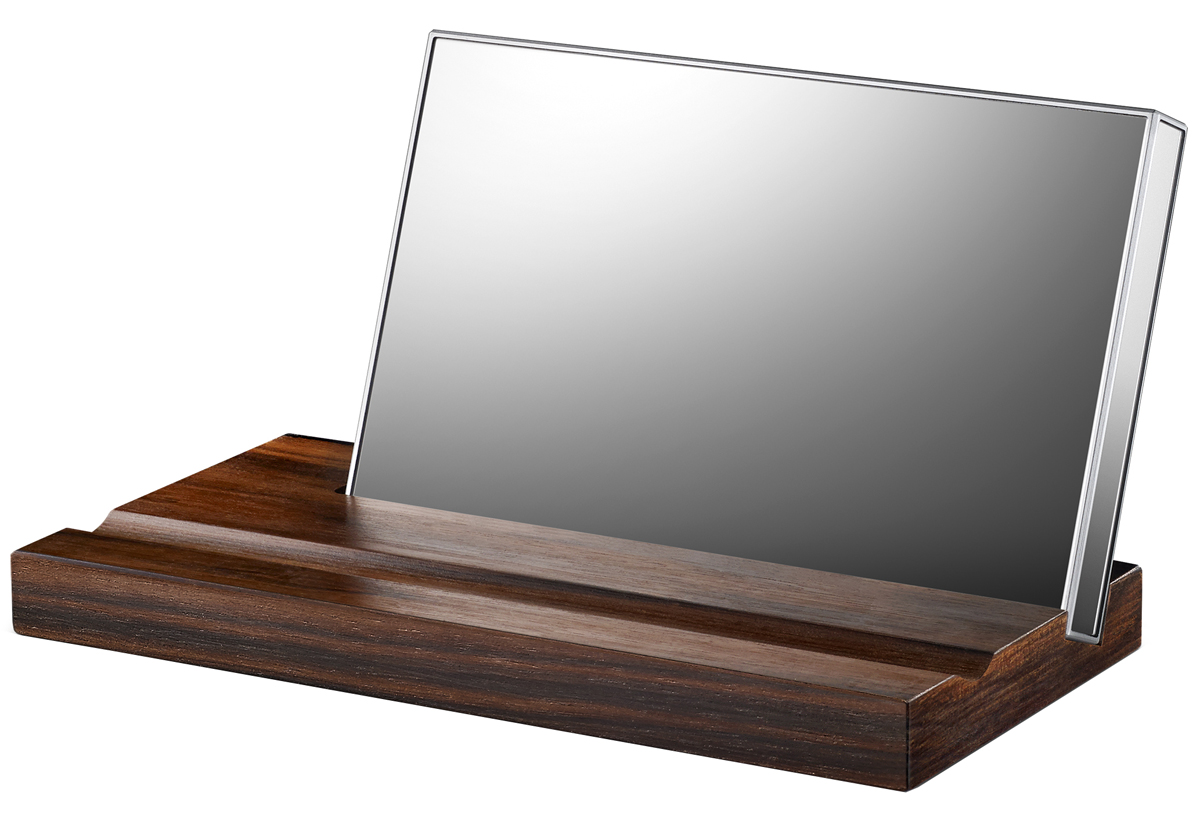 LaCie Mirror 1TB внешний жесткий дискLAC9000574 LaCie Mirror 1TB внешний жесткий дискLAC9000574LaCie Mirror - это портативный внешний жесткий диск, который компания LaCie разработала с известным французским дизайнером Полиной Дельтур. Жесткий диск имеет объем в 1 Тб, оснащен разъемом USB 3.0 и является отличным устройством для хранения цифровых фотографий, музыки, игр, фильмов и документов. Особенностью модели является корпус покрыт зеркальными панелями с удобной деревянной подставкой с подставкой из элитного черного дерева породы макассар, идущей в комплекте.Корпус жесткого диска выполнен из закаленного стекла Corning Gorilla Glass 3, который в сочетании с технологией дополнительного сопротивления повреждениям Native Damage Resistance (NDR), делает устройство еще более надежным. Со всех сторон корпус покрыт зеркальными панелями и высококачественной пластмассой на всех гранях устройства. Жесткий диск может устанавливаться на подставку из эбенового дерева в которой имеется две канавки, одна накопителя, а вторая для ручки или карандаша. С таким дизайном внешний жесткий диск LaCie Mirror Portable Hard Drive станет не только надежным хранилищем файлов, но и замечательным украшением рабочего стола.LaCie Mirror подключается к ПК через интерфейс USB 3.0 и имеет обратную совместимость для USB 2.0. Небольшой логотип LaCie рядом с портом USB, является индикатором питания, который светится белым цветом когда включен и мигает когда накопитель загружает какую-то информацию. Скорость передачи внешних данных составляет 500 Мб/с. Он имеет компактные размеры 2,5 и небольшой вес, что делает его отличным портативным устройством и дает возможность носить всегда с собой. Для более комфортной транспортировки в комплекте идет чехол.