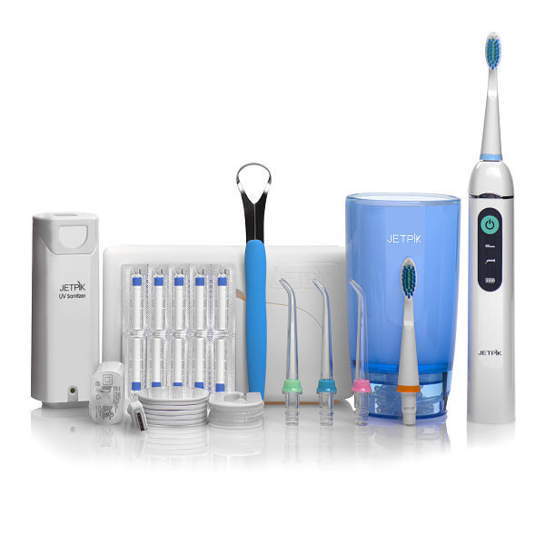 Ирригатор полости рта Jetpik JP200-UltraJA05-107-02 Ирригатор полости рта Jetpik JP200-UltraJA05-107-02Сочетает в себе очищающее действие зубной нити (смарт-флосса), воды и воздуха. В ирригатор добавлена функция звуковой зубной щетки. Легкий в использовании, очень эффективный и экономит время. Здоровые десны и чистые зубы уже через 7 дней Клинически доказано, что удаляет до 99% зубного налета. Инновационная комбинация давления воды и пульсирующей флосс- системы (20-25 колебания в сек) удаляет остатки пищи глубже и быстрее, между зубами и ниже линии десен, в труднодоступных местах вокруг брекетов, между зубными имплантатами и коронками. Пульсирующая под давлением воды смарт флосс - система создает дополнительную силу трения. Лабораторно доказано что JETPIK на 240% более эффективно удаляет зубной налет и биопленку, чем обычные водные ирригаторы. Эффективный, безопасный и простой в использовании. Идеально подходит для тех, кто с имплантатами, коронками, брекет-системами, мостовидными протезами, пародонтальными карманами. Портативный и компактный - по размерам не больше электрической зубной щетки, благодаря встроенной литиевой батарее заряжается как мобильный телефон через базовое зарядное устройство или USB разъем. Как жидкость для ирригации можно использовать не только воду, но и лечебные растворы. Удобный специальный стакан JETPIK или любая емкость подойдет как резервуар, благодаря портативной силиконовой клипсе JETPIK, которая идет в комплекте с набором. Уникальное дезинфицирующее средство, чтобы уничтожить бактерии на зубной щетке и насадках (UV санитайзер). Мощность 200-550 кПа.