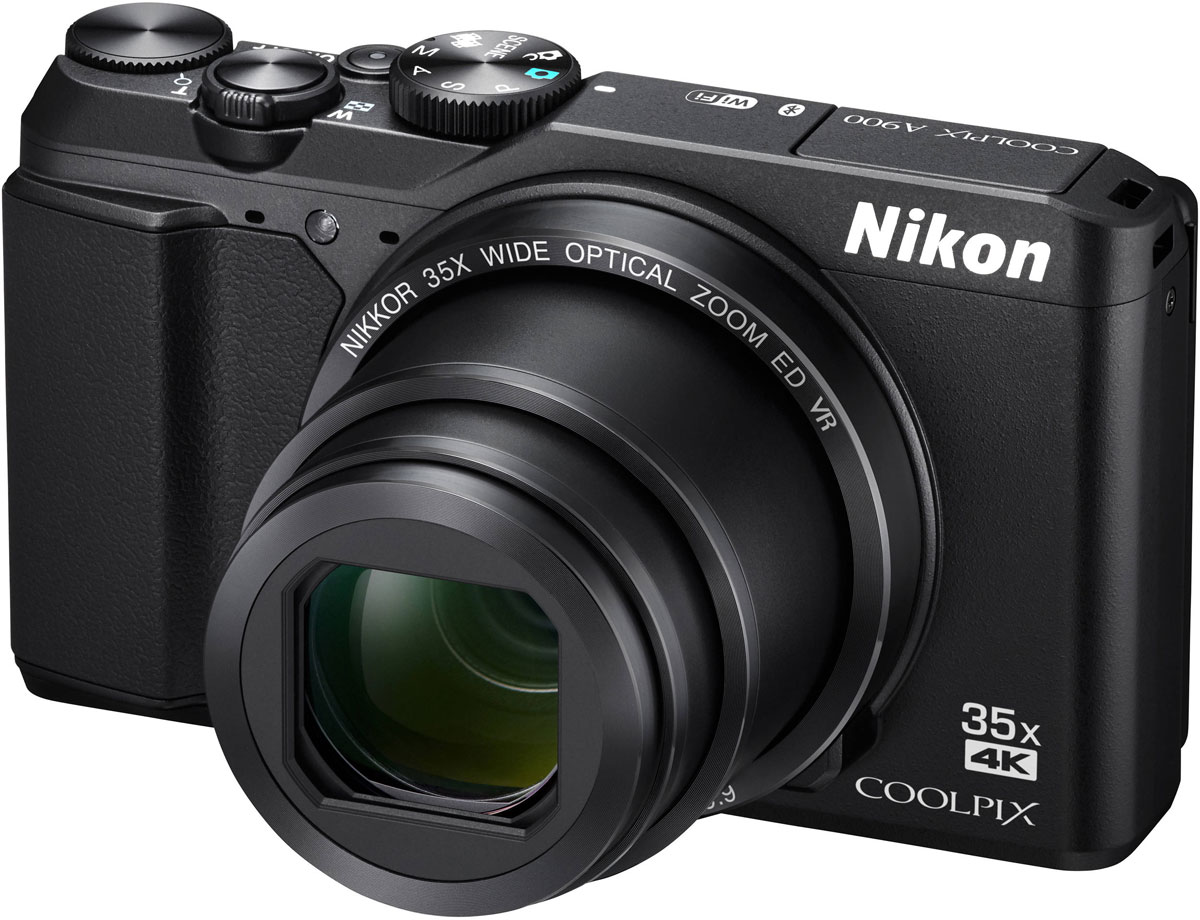 Nikon Coolpix A900, Black цифровая фотокамераVNA910E1 Nikon Coolpix A900, Black цифровая фотокамераVNA910E1Исключительное качество оптики NIKKOR в компактном корпусе Nikon Coolpix A900, который прекрасно впишется в любой стиль жизни. Снимайте великолепные пейзажи во время путешествий с высокой детализацией с помощью объектива с мощным 35-кратным оптическим зумом, который можно расширить до 70-кратного с помощью функции Dynamic Fine Zoom, или запечатлевайте памятные моменты на четких видеороликах в формате 4K UHD. Поворотный экран и несколько ручных режимов экспозиции (P/S/A/M) открывают простор для творчества, а приложение SnapBridge позволяет поддерживать соединение фотокамеры с интеллектуальным устройством.Благодаря высокоскоростной АФ вы будете мгновенно готовы запечатлеть интересный момент, а также сможете легко повторно поймать объект в кадр, воспользовавшись кнопкой возврата зуммирования, и без усилий создавать великолепные интервальные видеоролики.В компактном корпусе фотокамеры Nikon Coolpix A900 кроется сила легендарной оптики NIKKOR, которая обеспечивает неизменную четкость фотографий и плавность видеороликов. Выполненная в классическом стиле компактная фотокамера открывает совершенно новые возможности для съемки.Мощный объектив охватывает обширный диапазон углов зрения: от широкоугольного 24 мм до супертелефото 840 мм (эквивалент для формата 35 мм). С легкостью снимайте все одробности жизни вокруг и создавайте уникальные кадры даже с расстояния 1 см с помощью функции макросъемки.Эффективная система подавления вибраций корректирует последствия дрожания компактной фотокамеры даже при использовании максимального зума, поэтому вы можете создавать четкие снимки и плавные видеоролики. Функция подавления вибраций (VR) со смещением линз и электронный VR позволяют создавать четкие фотографии с выдержкой на 4,0 ступени длиннее (в соответствии со стандартами CIPA, в максимальном положении телефото). 5-осевая гибридная система VR обеспечивает стабилизацию камеры при съемке видеороликов, поэтому ваши записи всегда будут оставаться четкими.КМОП-матрица с обратной подсветкой с большим числом мегапикселей позволяет создавать резкие изображения с низким уровнем шума даже в условиях низкой освещенности. Вы получаете фотографии с высоким разрешением даже при съемке в ночное время.Одно нажатие специальной кнопки видеосъемки — и вы можете снимать видеоролики в формате 4K UHD (3840 x 2160/30p) со стереозвуком. Функция Пауза позволяет останавливать и возобновлять запись того же видеоролика. Во время просмотра видео можно сохранять фотографии или с помощью функции обработки видеороликов удалять ненужный материал до и после того действия, которое вы хотите сохранить.Приложение SnapBridge поддерживает постоянное соединение малой мощности между фотокамерой и смартфоном или планшетом, позволяя с легкостью управлять различными этапами съемки и работы с изображениями. Теперь вы можете мгновенно передавать снимки на интеллектуальное устройство с помощью синхронизации и сразу же обмениваться высококачественными снимками. Кроме того, вы можете управлять основными функциями фотокамеры с помощью мобильного телефона, автоматически устанавливать правильную дату и время и выполнять другие действия.С легкостью создавайте впечатляющие видеоролики с помощью функций Интервальный видеоролик и Цейтраферная видеосъемка. Функция Интервальный видеоролик позволяет сохранять фотографии из записанного видеоролика, которые автоматически воспроизводятся в виде ускоренного видеоролика со скоростью 30 или 25 кадров в секунду. В отличие от обычной цейтраферной видеосъемки, где запись ведется в фиксированном положении, во время интервальной съемки запись можно вести с различных ракурсов, изменяя компоновку кадра. При использовании функции цейтраферной видеосъемки вы можете автоматически создавать 10-секундные видеоролики из кадров, сделанных с использованием интервальной съемки. Просто выберите нужный сюжет (городской пейзаж, пейзаж или закат) и для вас будет установлен наиболее подходящий интервал.Вы можете легко выбрать один из режимов (P/S/A/M) при помощи диска выбора режимов на верхней панели корпуса фотокамеры, чтобы вручную управлять выдержкой или диафрагмой. Ручные элементы управления помогут сделать отличный кадр в сложной ситуации, например при съемке быстро движущихся объектов, когда требуется более короткая выдержка во избежание смазывания. Диск управления предоставляет удобный доступ к ряду функций. При отображении меню или параметра поверните диск управления или мультиселектор и выберите функцию. Кроме того, с помощью диска управления можно настраивать увеличение снимков при просмотре, а также перематывать видеоролики вперед и назад. Вам больше не нужно искать функции по всему меню — просто поверните диск.