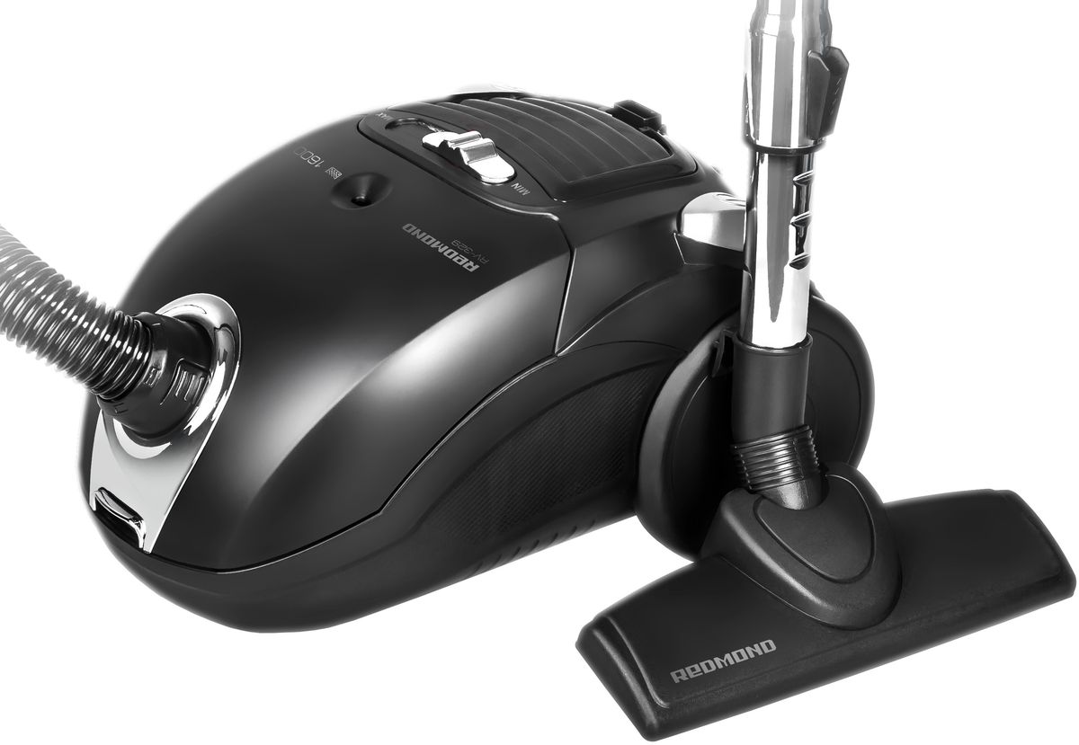 Redmond RV-329, Black пылесосRV-329 черный Redmond RV-329, Black пылесосRV-329 черныйМощный пылесос Redmond RV-329 оснащен 3 насадками для быстрой и качественной уборки. Универсальная насадка позволяет очистить разнообразные напольные покрытия: от гладкого ламината, линолеума и паркета до ковра с коротким ворсом. Щелевая насадка 2 в 1 поможет убрать пыль и загрязнения в узких проемах между шкафом и полом, а с помощью насадки для мягкой мебели вы легко удалите пыль и шерсть домашних животных с диванов, кресел, пледов и подушек.В комплекте RV-329 предусмотрен многоразовый мешок для сбора пыли. Он выполнен из прочного воздухопроницаемого текстиля: пылесборник не порвется даже при попадании влажного и крупного мусора. Вам не придется вытряхивать и чистить мешок после каждого использования пылесоса. Специальный индикатор на корпусе прибора покажет, что пылесборник заполнился и его пора очистить.В воздухе могут содержаться мелкие частицы пыли, вредные микроорганизмы, пыльца и споры грибов, которые провоцируют аллергические реакции и ухудшение самочувствия людей с заболеваниями дыхательных путей. Пылесос RV-329 оснащен выпускным HЕРА-фильтром Е12 . Он способен удерживать мельчайшие частицы от выброса обратно в воздух.В пылесосе предусмотрены удобный регулятор мощности на корпусе, возможность горизонтальной и вертикальной парковки и автоматическое сматывание шнура.Пылесос Redmond RV-329 – сила без лишнего шума!