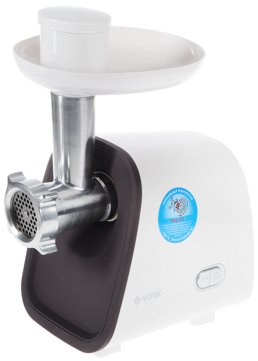 Vitek VT-3603(BD) мясорубкаVT-3603(BD) Vitek VT-3603(BD) мясорубкаVT-3603(BD)Благодаря своему DC мотору, усовершенствованному редуктору и ультратихому вентилятору охлаждения новая мясорубка Vitek VT-3603(BD) бесшумно и быстро превратит мясо и рыбу в нежнейший фарш. Небольшие габариты VT-3603 позволяют ей идеально вписаться в кухню любых размеров.Данная модель способна приготовить до 1,5 кг фарша в минуту. В ней установлен мощный бесшумный DC мотор. Мощность такого мотора в 2 раза, а срок службы в 3 раза превышает соответствующие показатели обычного мотора. Благодаря бесшумному DC мотору, усовершенствованному редуктору со звукоизоляцией и тихому вентилятору охлаждения, мясорубка работает практически бесшумно. Одновременно с этим, мясорубка оснащена уникальной технологией Magnifit - заточка и шлифовка ножа и диска обеспечивают максимальное прилегание друг к другу, словно магнит – вы сможете получить фарш, измельчённый со 100% эффективностью.Мясорубка оснащена 2-мя дисками из высококачественной нержавеющей стали, что позволяет им служить долго и сохранять полезные свойства продуктов. В комплекте предусмотрены дополнительные насадки: насадка для приготовления сосисок и кеббе (полые колбаски с начинкой). Данные приспособления значительно облегчат приготовление домашних колбас, сосисок и многих других блюд сложного и трудоемкого приготовления.Функция Реверс убережет прибор от поломки: система, проворачивающая шнек мясорубки (спираль, осуществляющая прокрутку фарша) в обратном направлении позволяет избавиться от жил, намотавшихся на шнек и затрудняющих работу мясорубки.Прибор также оснащен специальной системой защиты: при перегреве или перегрузках двигателя сработает система защиты, и мясорубка отключится.