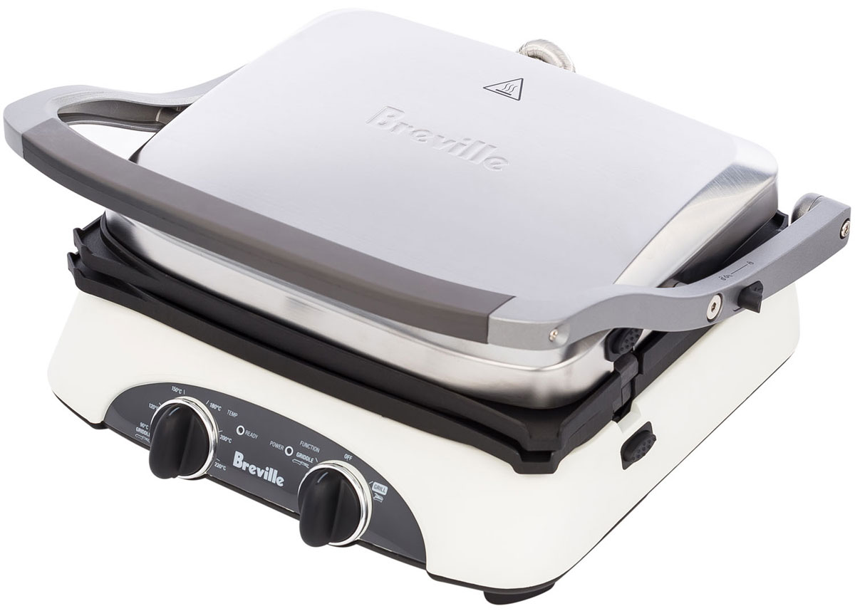 Breville G360 электрогриль69173 Breville G360 электрогриль69173Breville G360 – удобный настольный гриль, конструкция которого предоставляет несколько вариантов использования. Предусмотрено три варианта положения верхней крышки. Можно готовить в режиме контактного гриля, поместив продукты между нагревательными пластинами, можно запечь тосты, установив верхнюю пластину над продуктом, а можно раскрыть пластины на 180 градусов и получить открытый настольный гриль.Прибор имеет два режима работы: Grill и Griddle. В режиме Grill происходит равномерный нагрев продуктов с обеих сторон. Этот режим применяется при закрытом положении панелей. Используя режим Griddle можно регулировать температуру самостоятельно. Жарочные панели будут полностью раскрыты.Пластины имеют ребристую поверхность и антипригарное покрытие, исключающее подгорание. Для упрощения очистки панели являются съемными.Для сбора жира предусмотрен специальный сток (в подставляемые емкости). Гриль Breville оснащен регулируемым термостатом, который можно установить в диапазоне от 90 до 220°C. Для удобства хранения прибора предусмотрен отсек для сетевого шнура.