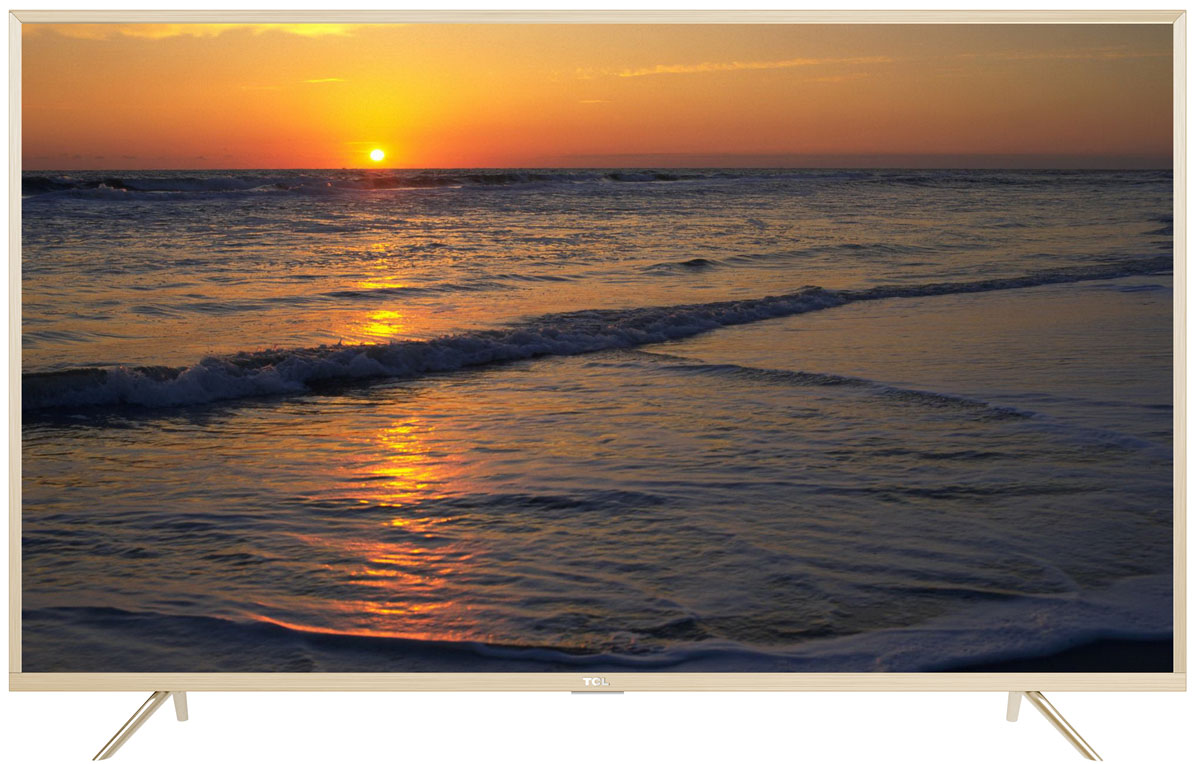 TCL L49P2US, Gold телевизорL49P2US TCL L49P2US, Gold телевизорL49P2USНа экране телевизора TCL L49P2US вы всегда будете видеть идеальное изображение формата 4К, вне зависимости от качества видеосигнала. За его обработку отвечает высокопроизводительный 64-х битный процессор, автоматически анализирующий и конвертирующий картинку и звук. Загружайте новый контент, смотрите фильмы, слушайте музыку - в наилучшем качестве!Сверхчеткое изображение нового телевизора TCL позволит в динамике рассмотреть ранее недоступные мельчайшие детали, наслаждаясь насыщенностью цветов и контрастностью! Стандарт видеоизображения позволяет просматривать фильмы и компьютерную графику в разрешении 4К - 3840 x 2160.Телевизор TCL L49P2US имеет самую современную технологию прорисовки полутонов, позволяющую добиваться невероятной реалистичности картинки. Вы видите на экране до миллиарда тончайших цветовых тонов, которые делают изображение неотличимым от оригинала.Smart-телевизор TCL откроет для вас новый мир, объединяющий сотни и тысячи телеканалов, интернет-серфинг и вселенные онлайн-игр. Загружайте любимые фильмы, делитесь своими лучшими фотографиями и видеозаписями в социальных сетях, слушайте музыку и узнавайте интересующие вас новости с помощью удобных предустановленных приложений.Процессор 4K в сочетании с технологией UHD Upscaling передает цвета более естественно в ярких сценах, делая изображение реалистичнее. Поддержка масштабирования изображения до разрешения 4К при просмотре видео обеспечивает невероятное богатство деталей, естественную цветопередачу и контрастность, а тональные переходы получаются более плавными.